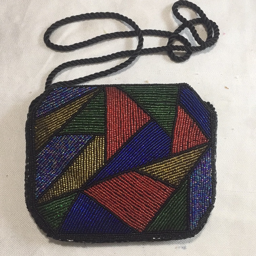 Brand new fully beaded crossbody bag.